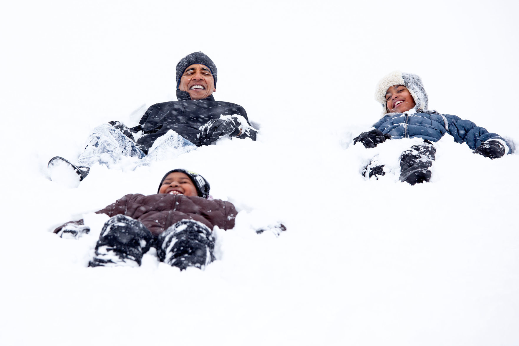Obama and his daughters, Sasha and Malia
